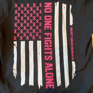 Hoodie sporting breast cancer awareness